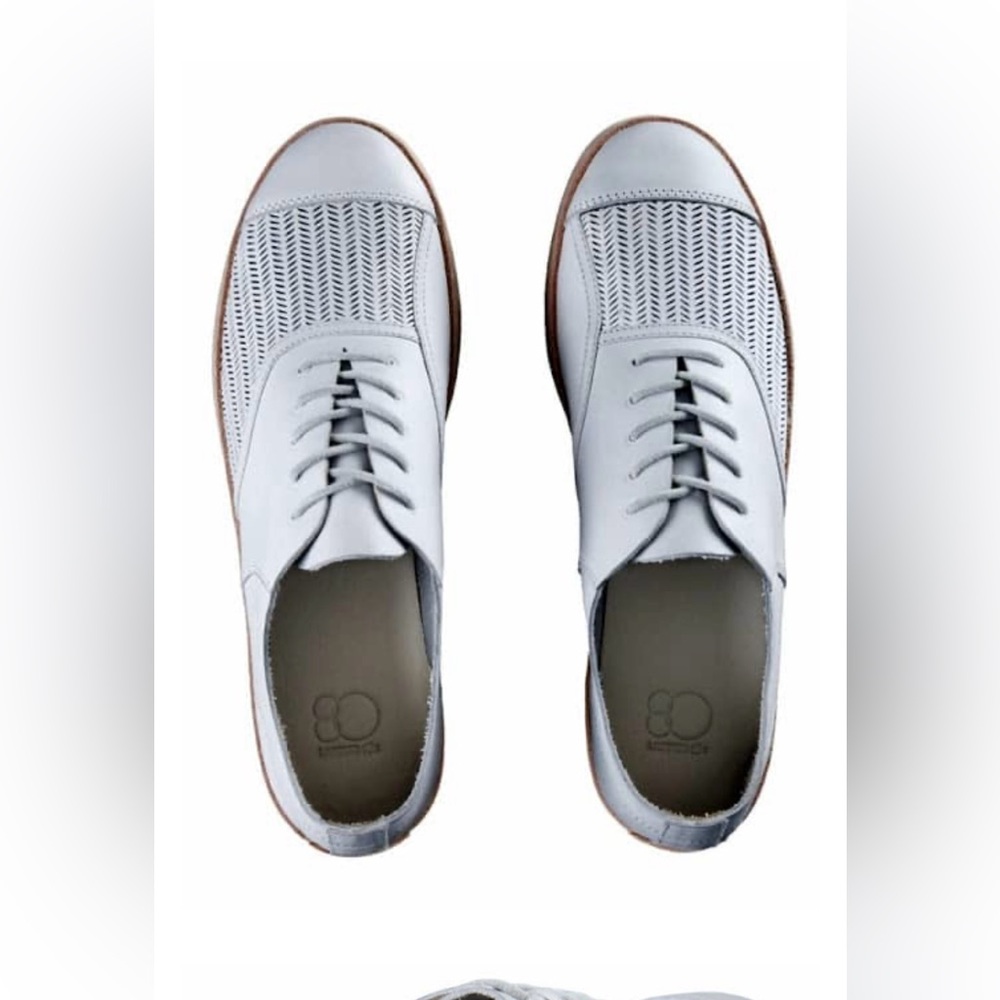 Lacoste Rene designer white perforated Leather Oxfords